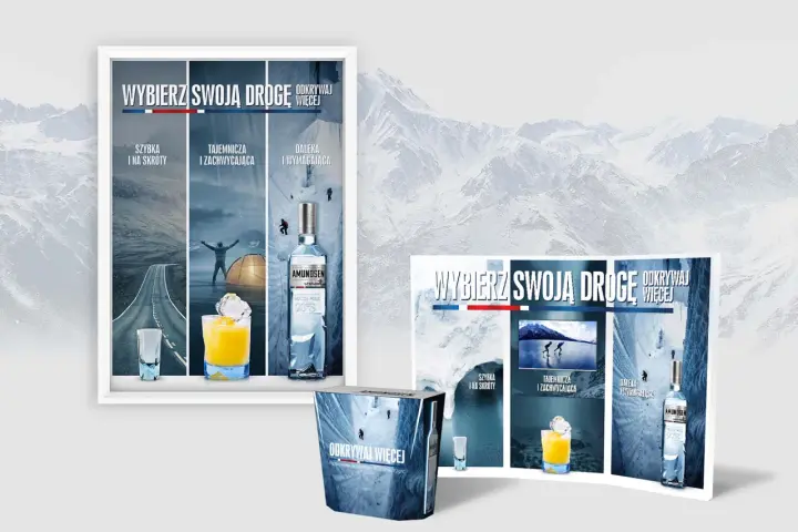 Wódka Amundsen w zimowej scenerii. Czy wódka Amundsen ma dozownik? Reklama zachęca do odkrywania.
